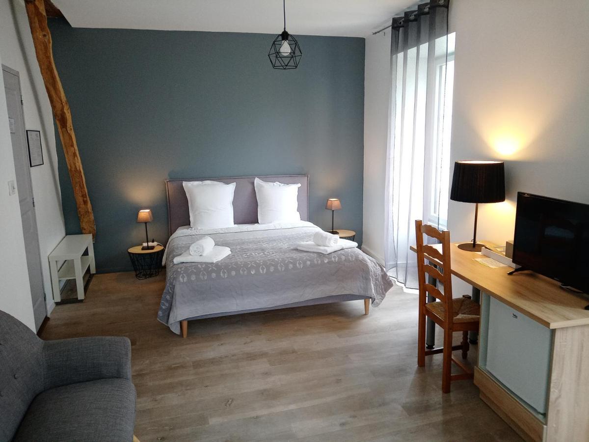 A Deux Pas Du Rheby Hotel Villebois Bagian luar foto